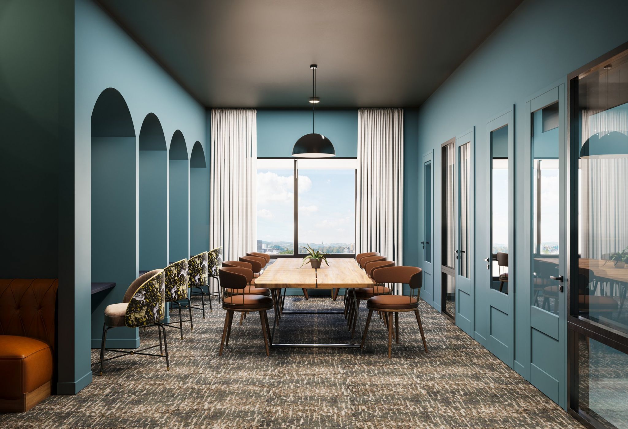 A modern meeting room with teal walls, a large wooden table surrounded by chairs, and a pendant light above. Floor-to-ceiling windows with white curtains let in natural light. The room features archways and glass-paneled doors on the side, perfect for your next local Nashville business gathering.