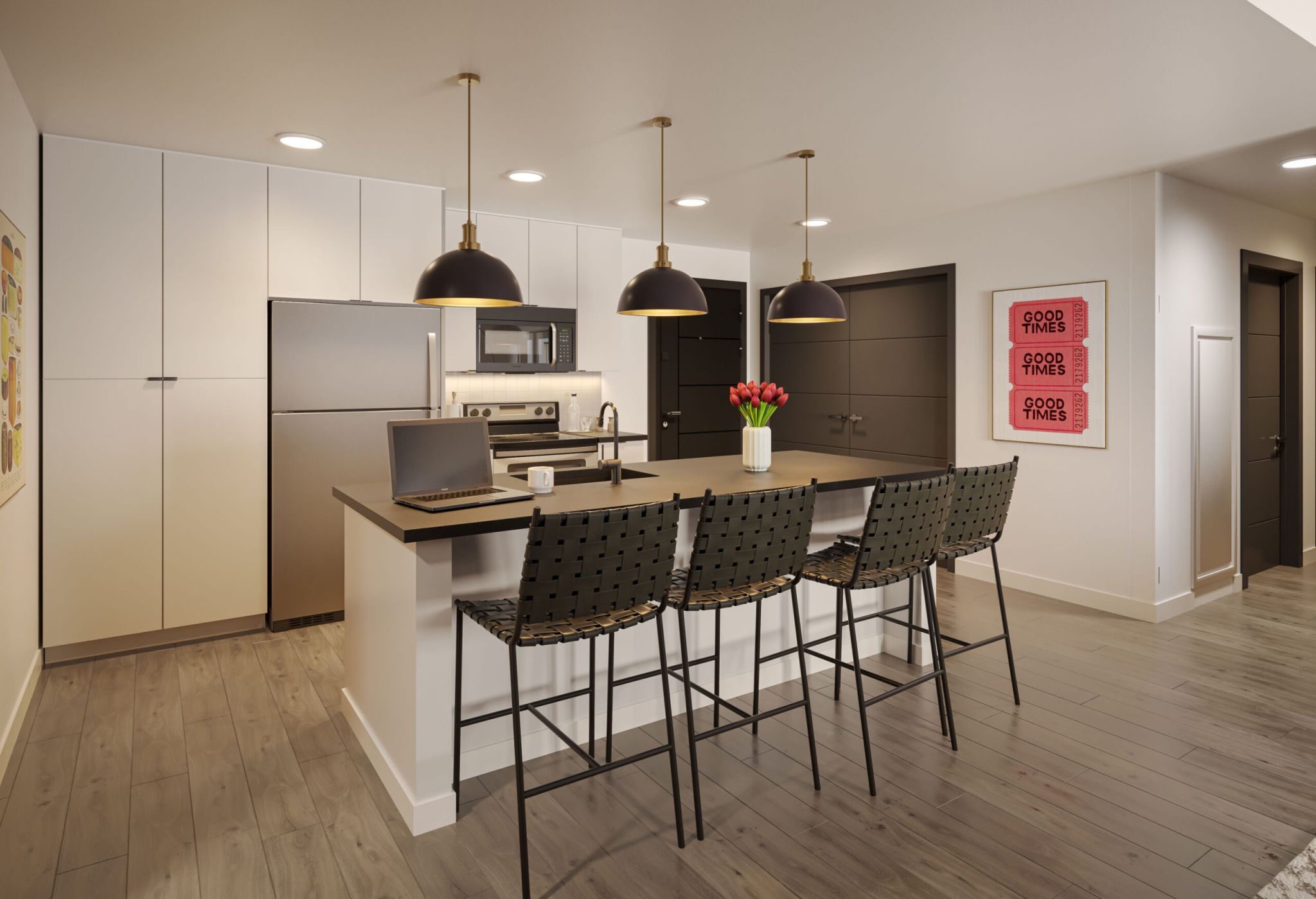 A modern kitchen in Madison features a large island with three woven bar stools, pendant lighting, stainless steel appliances, and light wood flooring. The decor includes wall art, a vase with red tulips by VERVE on the island, and minimalist white and dark cabinetry.